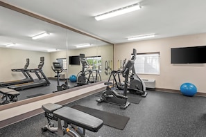 A gym with treadmills, weight machines, and exercise balls. - Holiday Inn Express Monticello by IHG (Monticello)