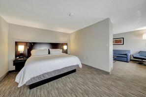 Suite, 1 cama King size, hidromasaje | Caja de seguridad en la habitación y escritorio 