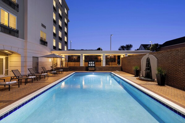 Outdoor pool, open 6:00 AM to 10:00 PM, free cabanas, pool umbrellas