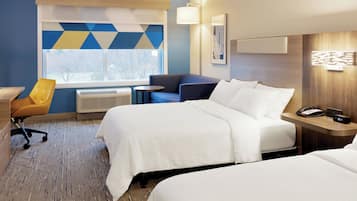 Suíte, várias camas | 1 quarto, frigobar, cofres nos quartos, escrivaninha