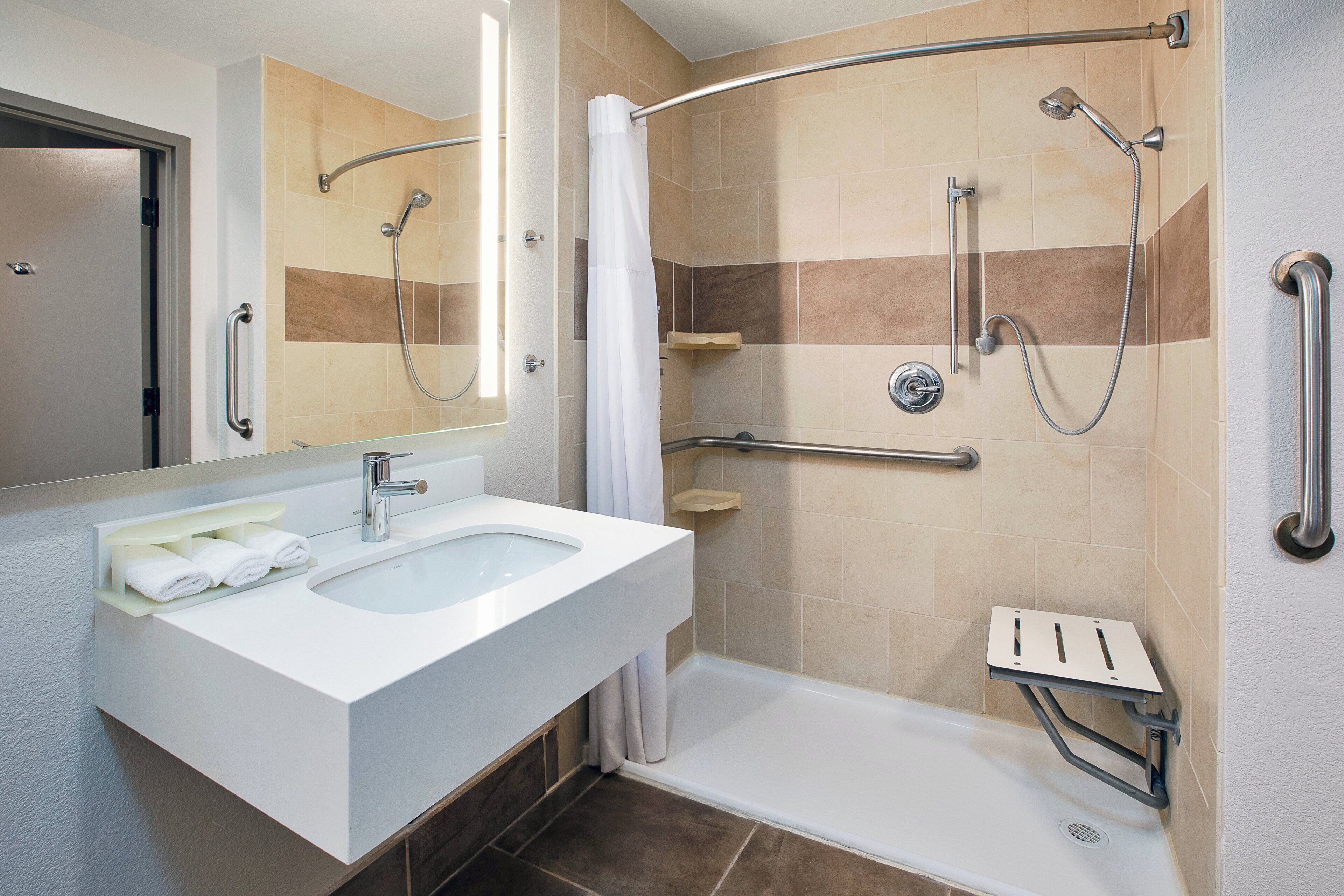 suite, 1 king bed, mobility accessible (comm, mobil roll in shwr) | desk, iron/ironing board, cots/infant beds, rollaway beds