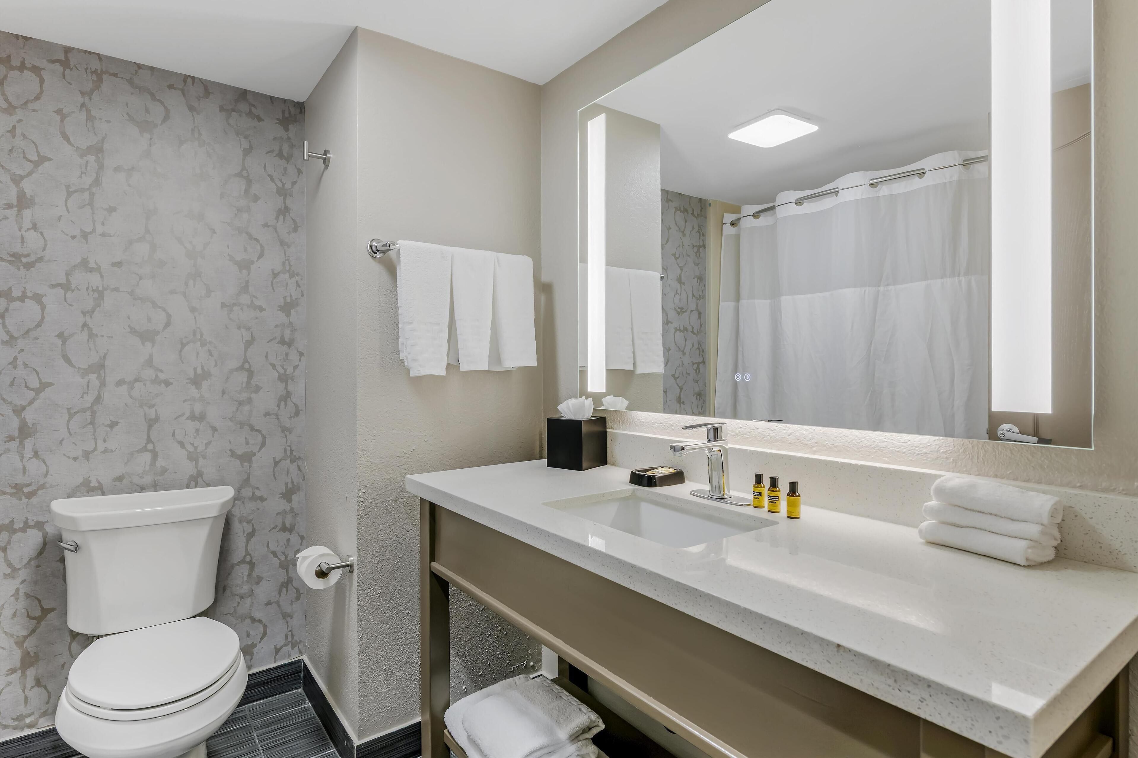 standard room, 2 queen beds, non smoking, refrigerator & microwave | bathroom | free toiletries, hair dryer, towels