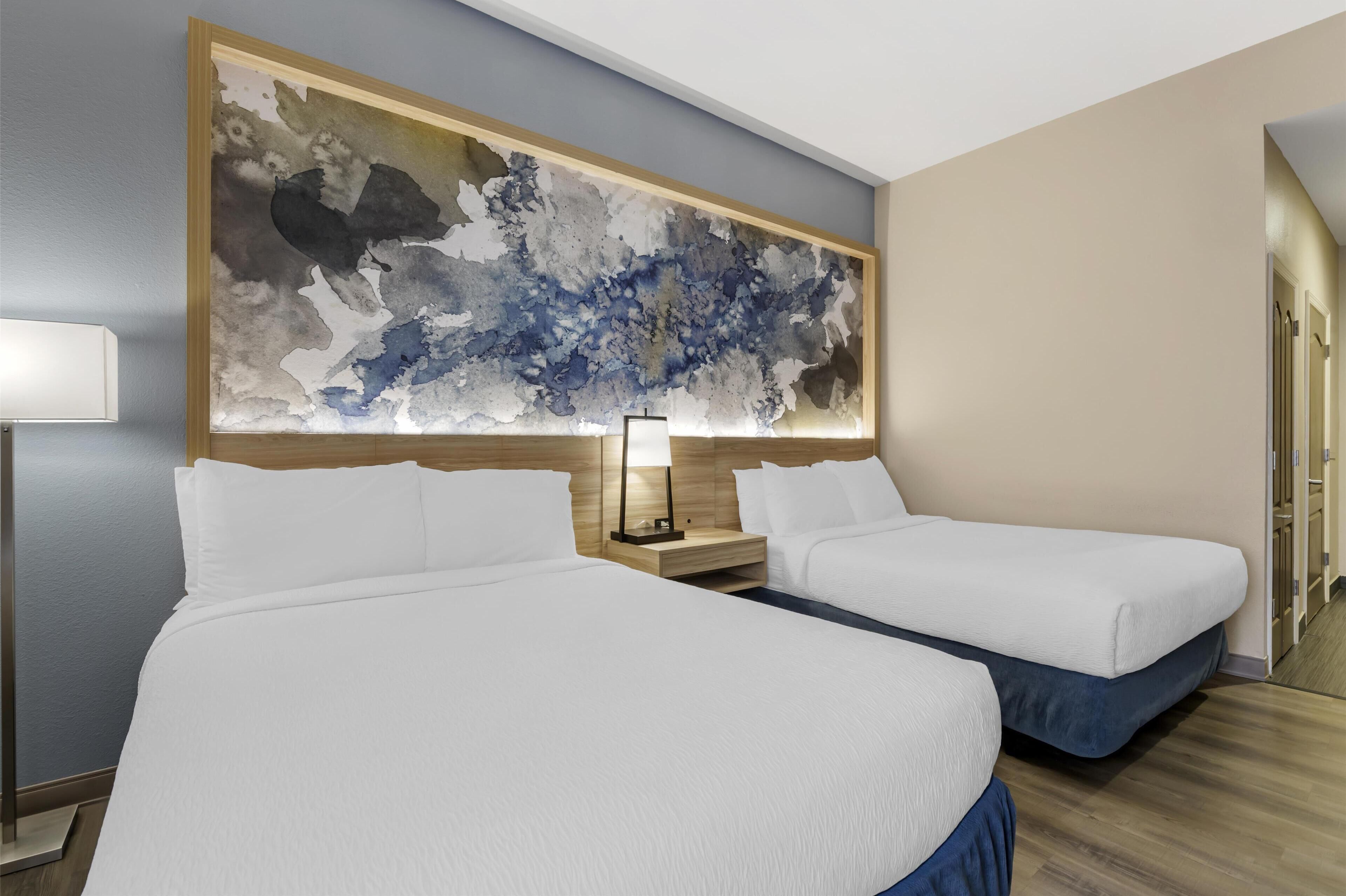 pillow-top beds, desk, laptop workspace, iron/ironing board