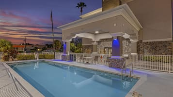 Outdoor pool, pool umbrellas, pool loungers