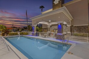 Outdoor pool, pool umbrellas, pool loungers