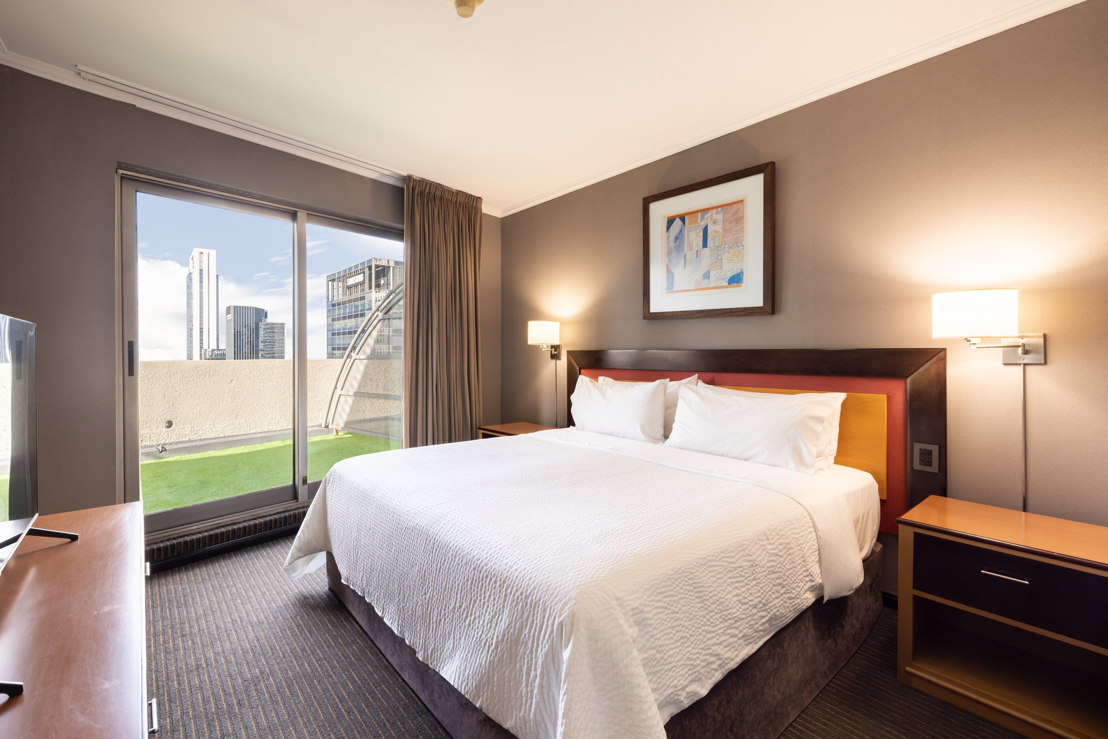 Suite, 1 King Bed, City View | Premium bedding, pillowtop beds, in-room safe, desk