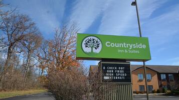 A sign for Countryside Inn & Suites advertising free high-speed internet.