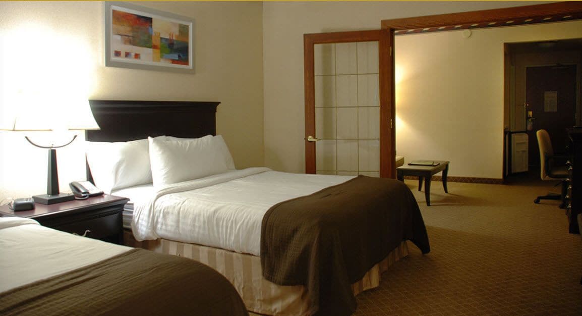 family suite, 1 bedroom | blackout curtains, iron/ironing board, free cots/infant beds