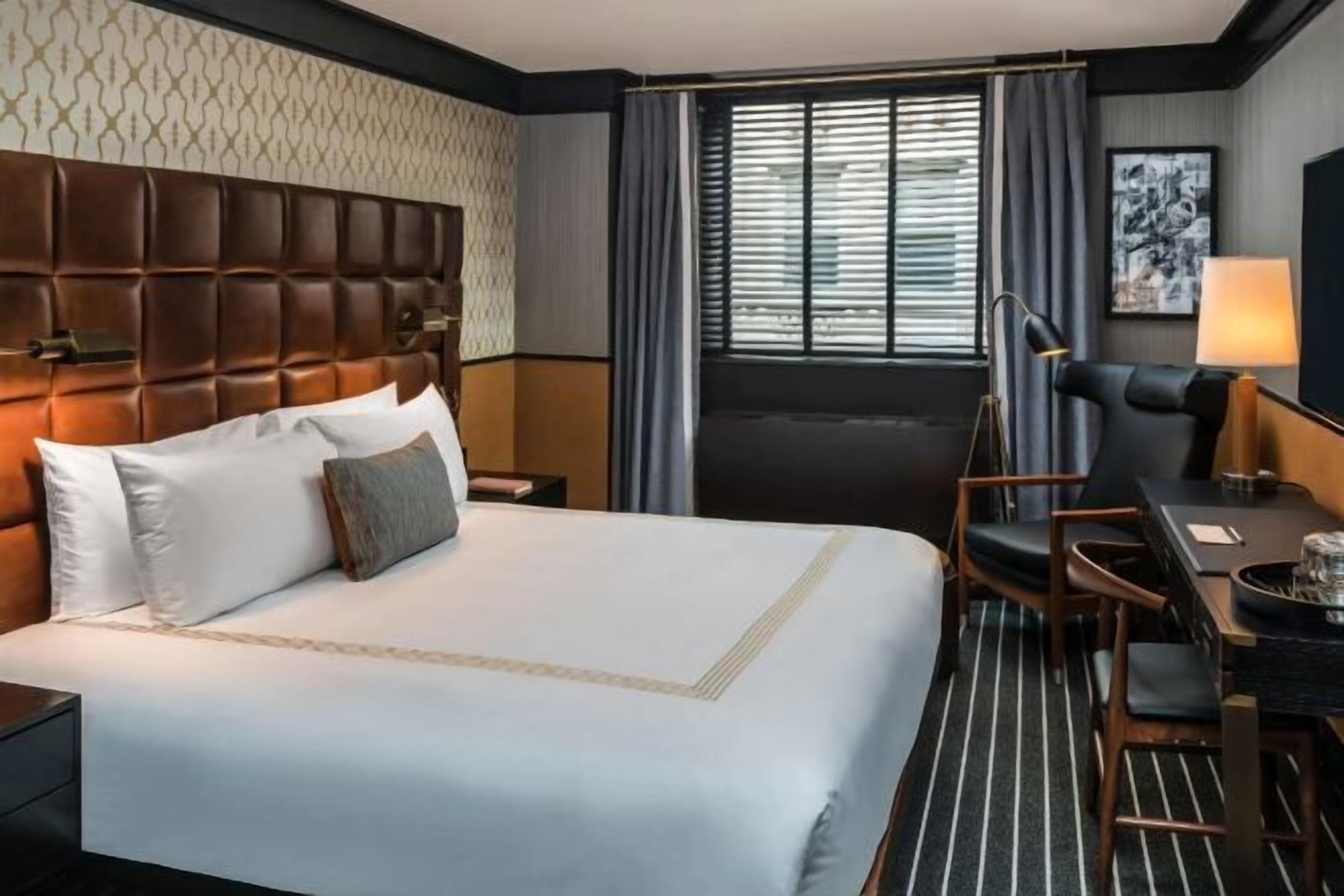 高档床上用品、羽绒被、迷你吧、客房内保险箱