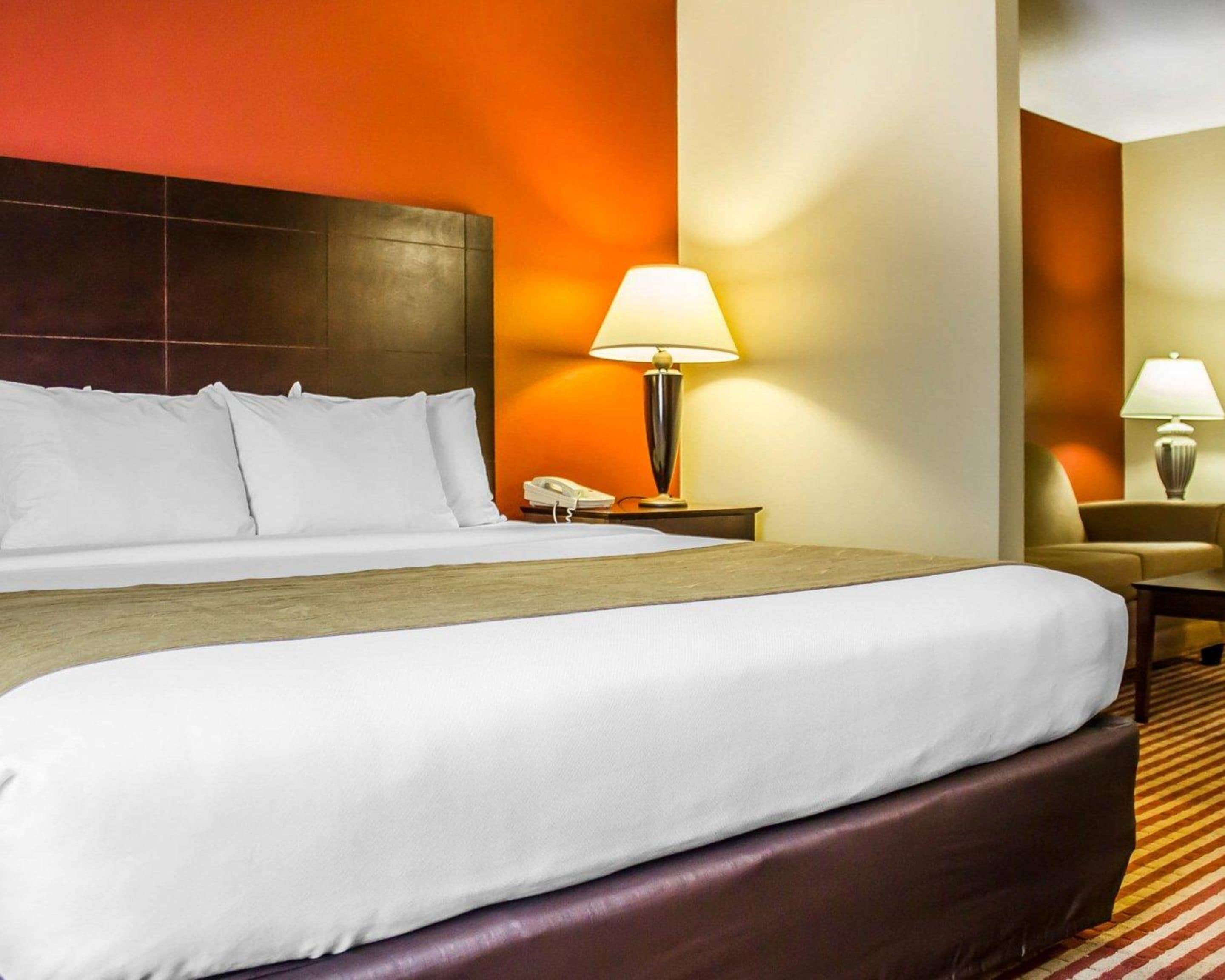 laptop workspace, blackout curtains, iron/ironing board