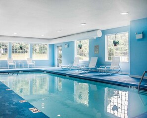 Indoor pool, open 6:00 AM to 10:00 PM, pool loungers