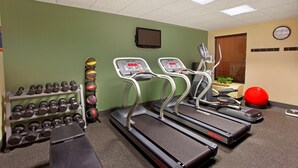 A gym with treadmills, dumbbells, and exercise balls. - Hampton Inn Sidney (Sidney)