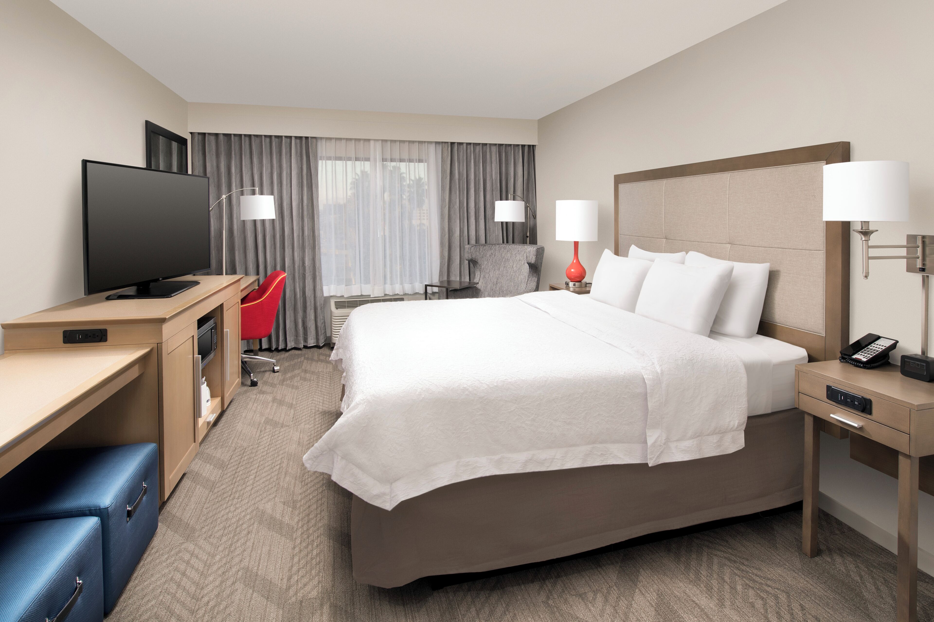 Suite, 1 King Bed, Balcony | Premium bedding, desk, laptop workspace, blackout drapes