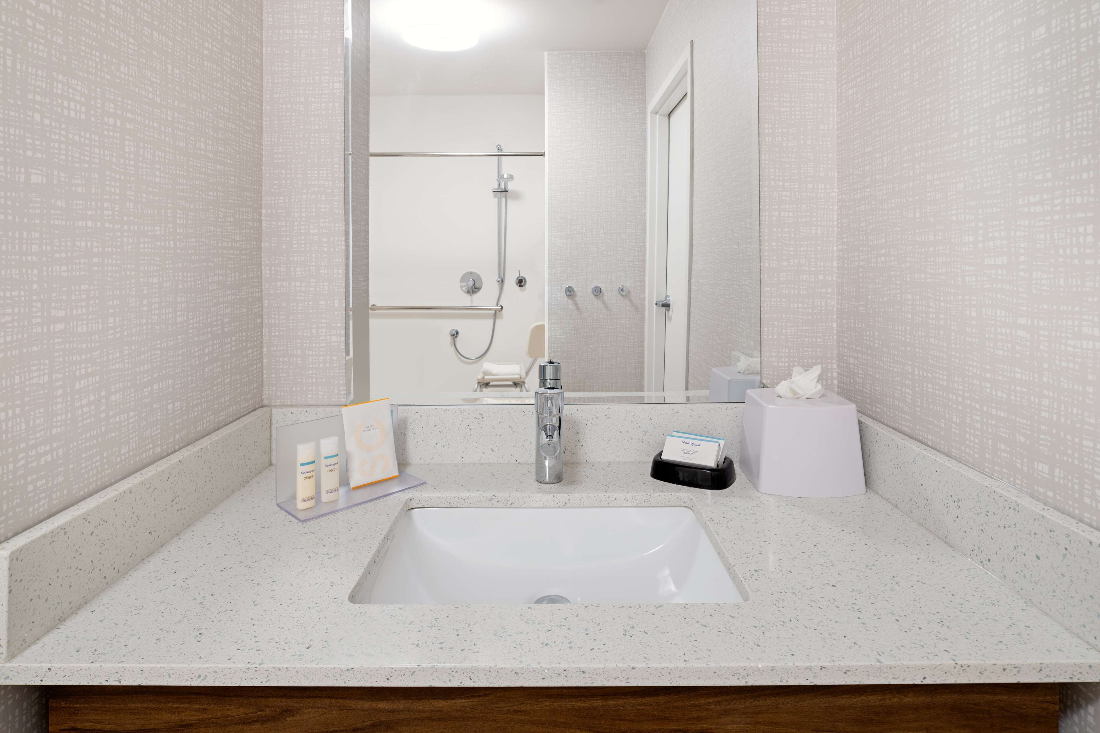 classic room, 1 king bed, accessible (mobility room - roll in shower) | bathroom | free toiletries, hair dryer, towels