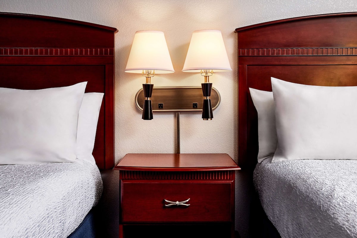 two queen beds non smoking | blackout curtains, iron/ironing board, travel cot, free wifi