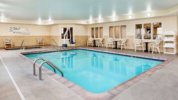 Indoor pool, open 6 AM to 10 PM, pool loungers
