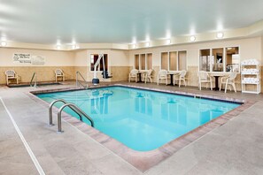 Indoor pool, open 6 AM to 10 PM, pool loungers