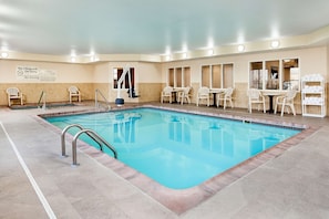 Indoor pool, open 6 AM to 10 PM, pool loungers