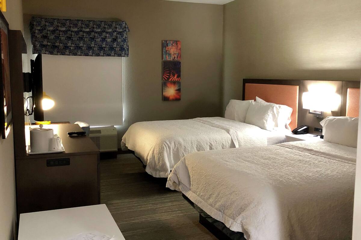 desk, laptop workspace, blackout curtains, iron/ironing board