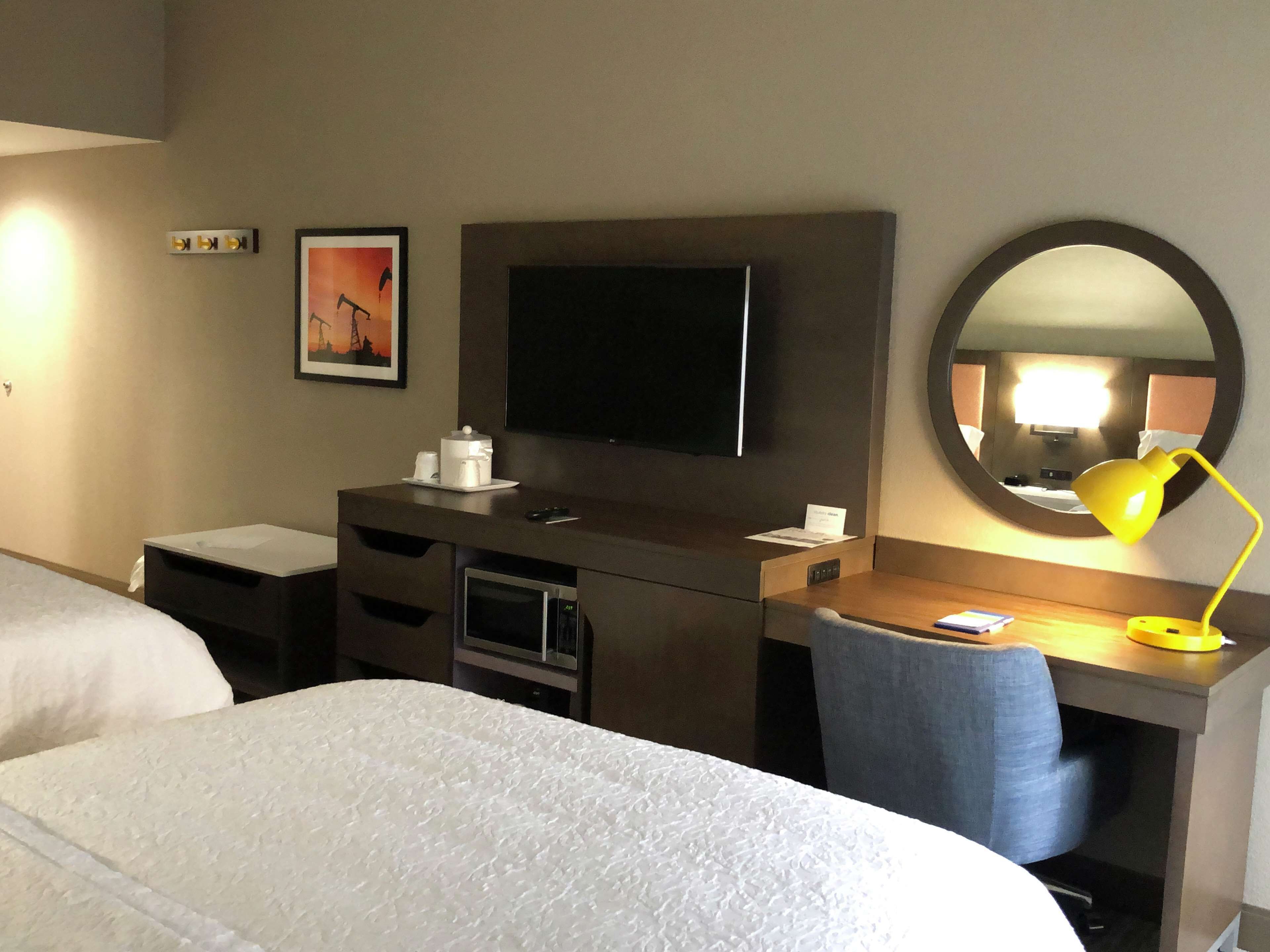 desk, laptop workspace, blackout curtains, iron/ironing board