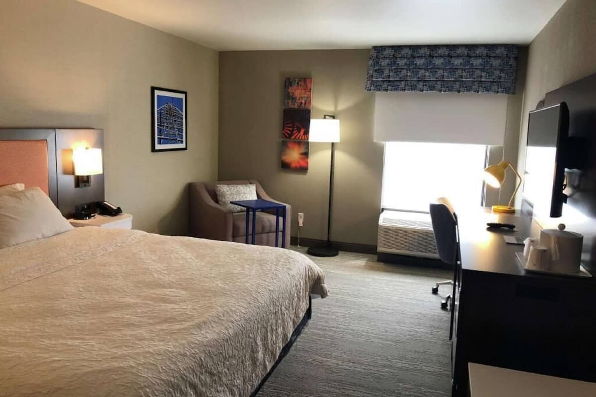 Desk, laptop workspace, blackout curtains, iron/ironing board