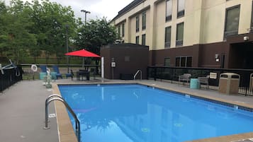 Seasonal outdoor pool, open 9 AM to 10 PM, pool umbrellas