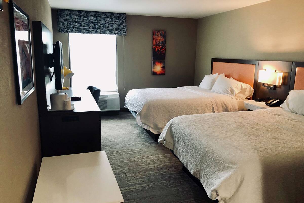 desk, laptop workspace, blackout curtains, iron/ironing board