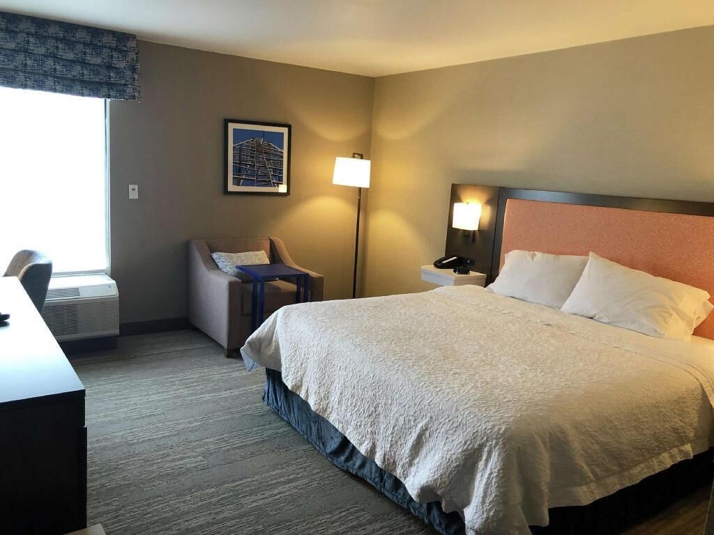 Desk, laptop workspace, blackout curtains, iron/ironing board