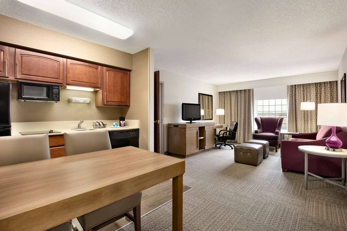 Suite, 1 King Bed, Non Smoking, Kitchen | Living area | TV, pay movies