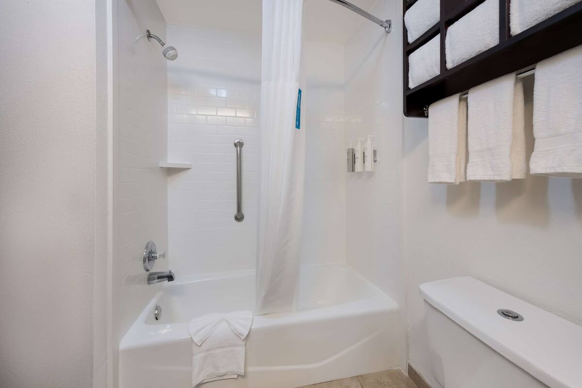 two queen beds non smoking | bathroom | hair dryer, towels