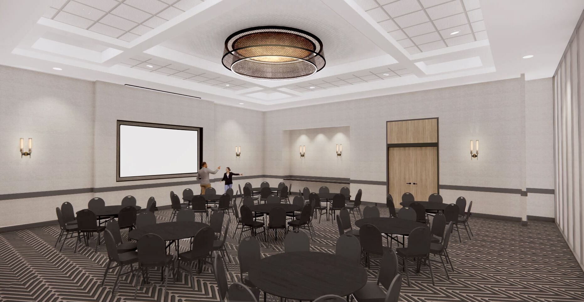 A conference room with a large screen, multiple tables, and chairs arranged for meetings.