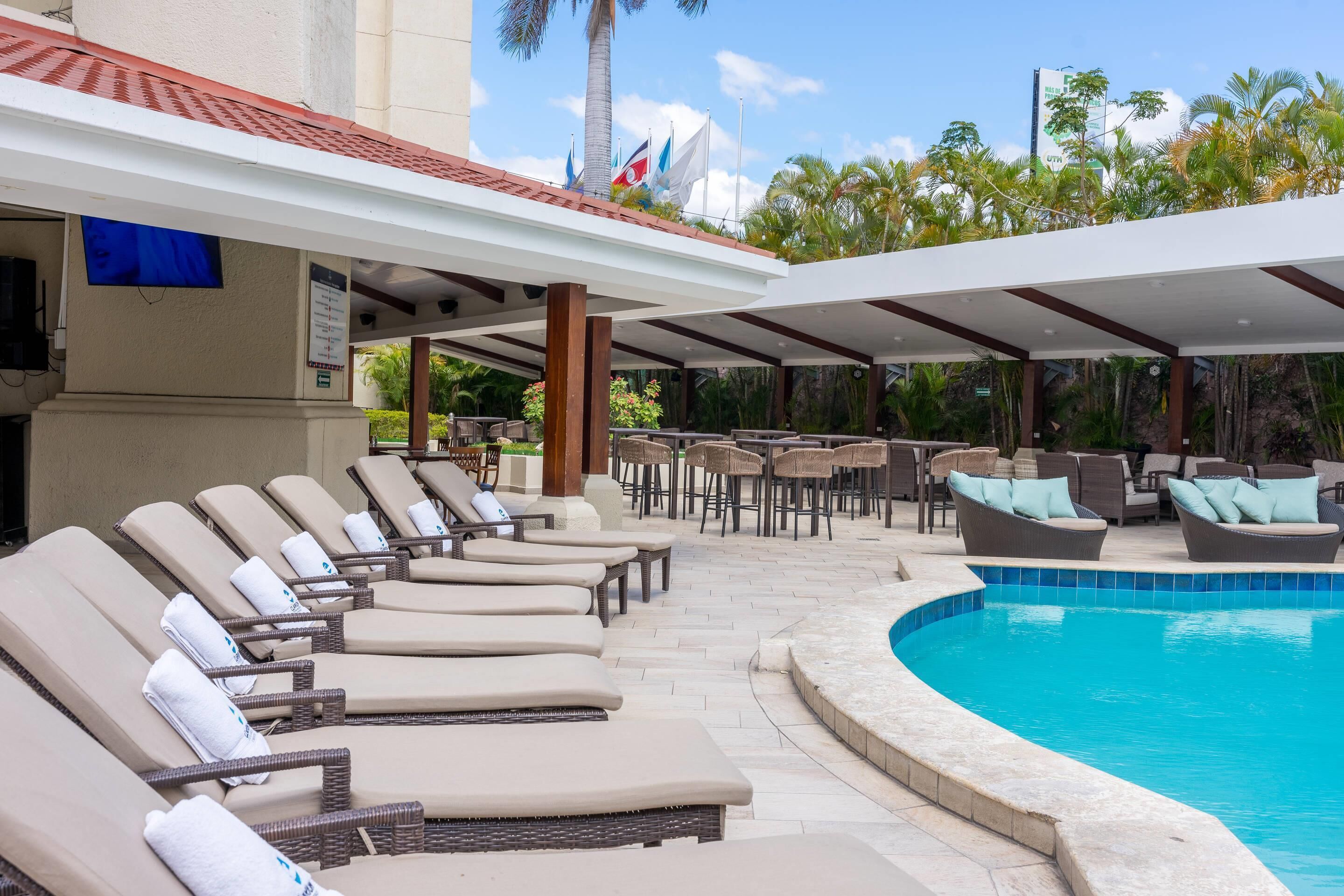 outdoor pool, open 9:00 am to 8:00 pm, free pool cabanas, pool umbrellas