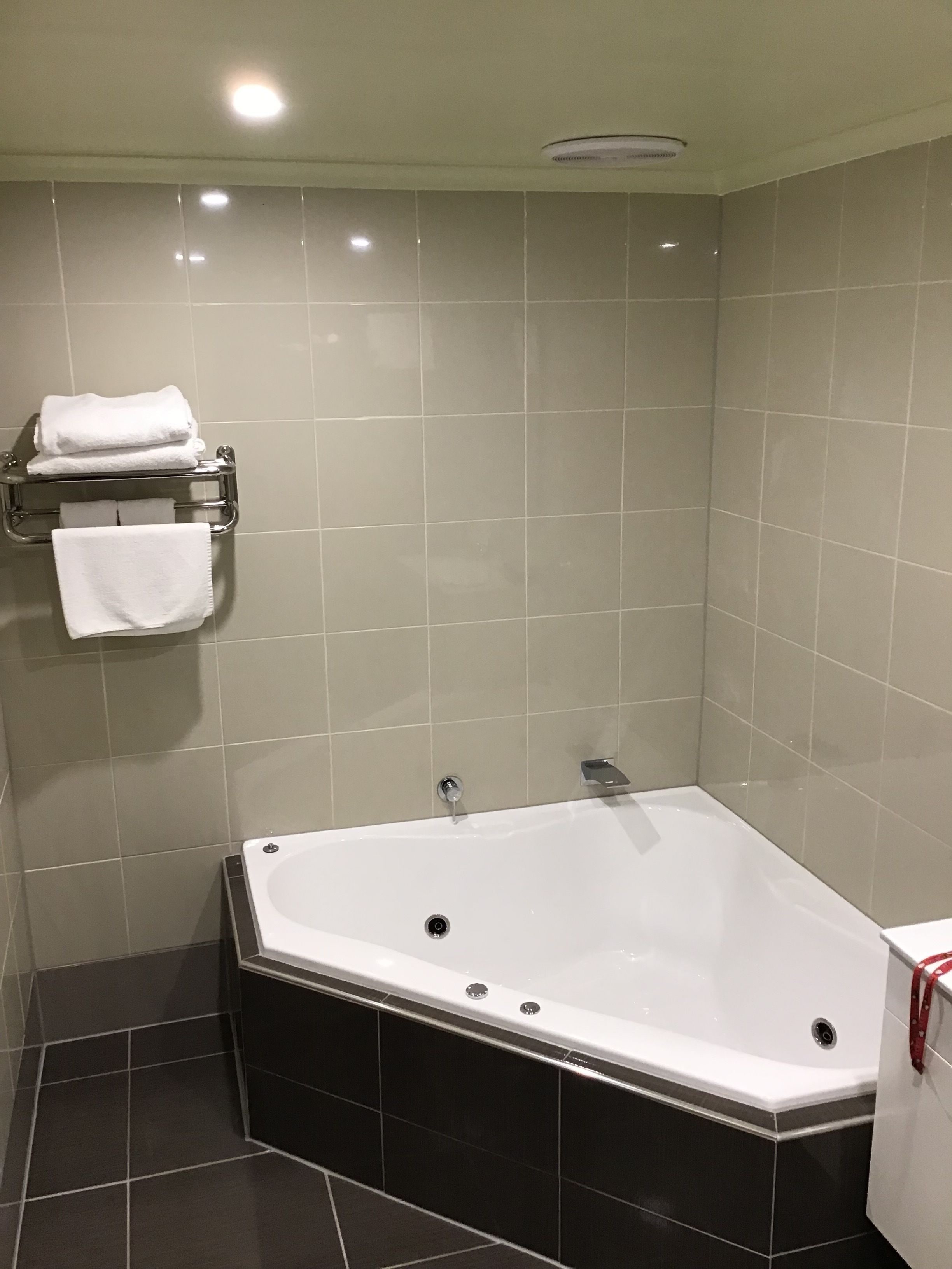 queen spa room | bathroom | shower, designer toiletries, hair dryer, towels