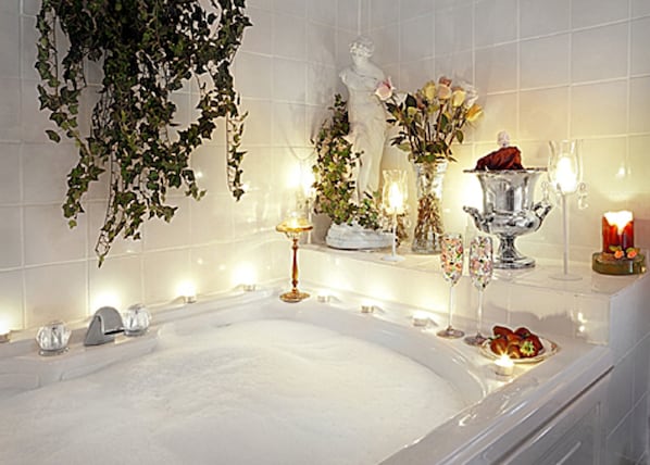 Renoir luxury suite | Bathroom | Designer toiletries, hair dryer, dressing gowns, towels