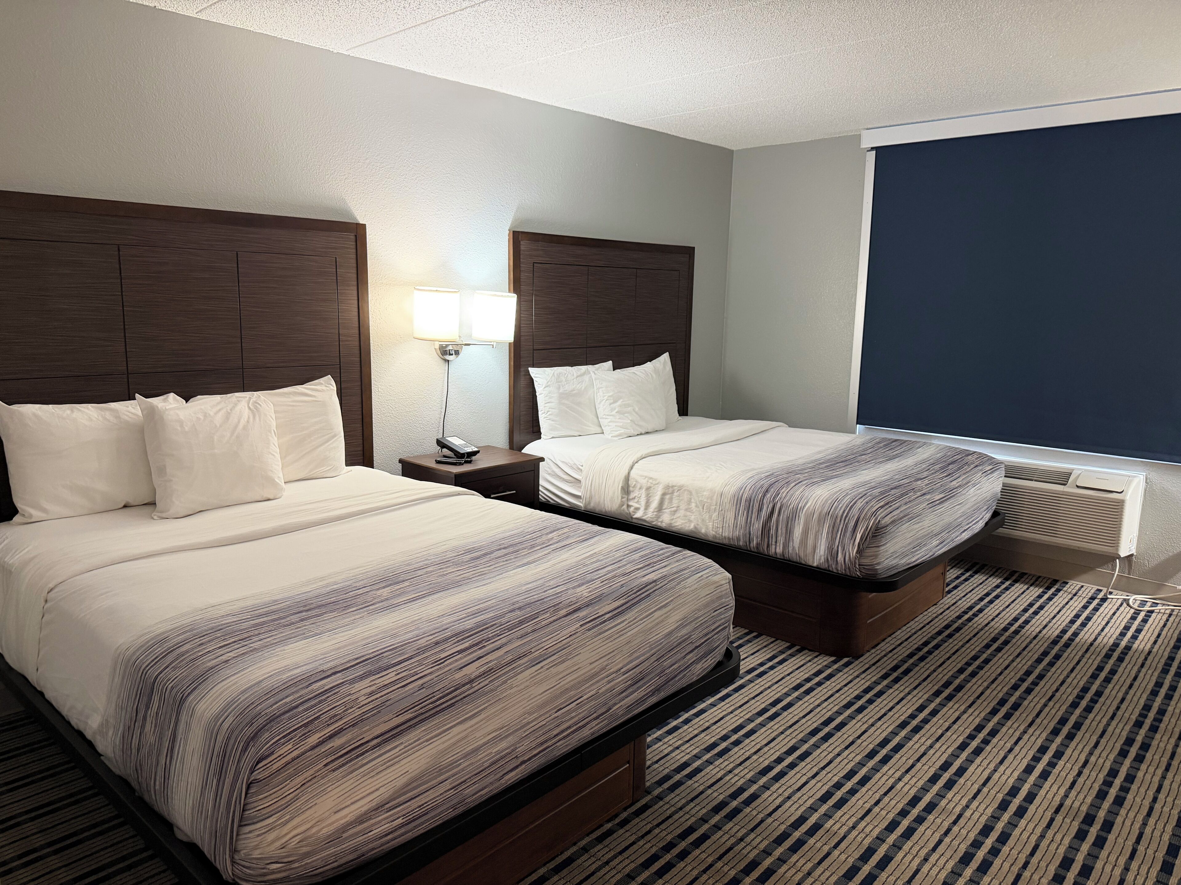 Pillow-top beds, desk, blackout curtains, soundproofing