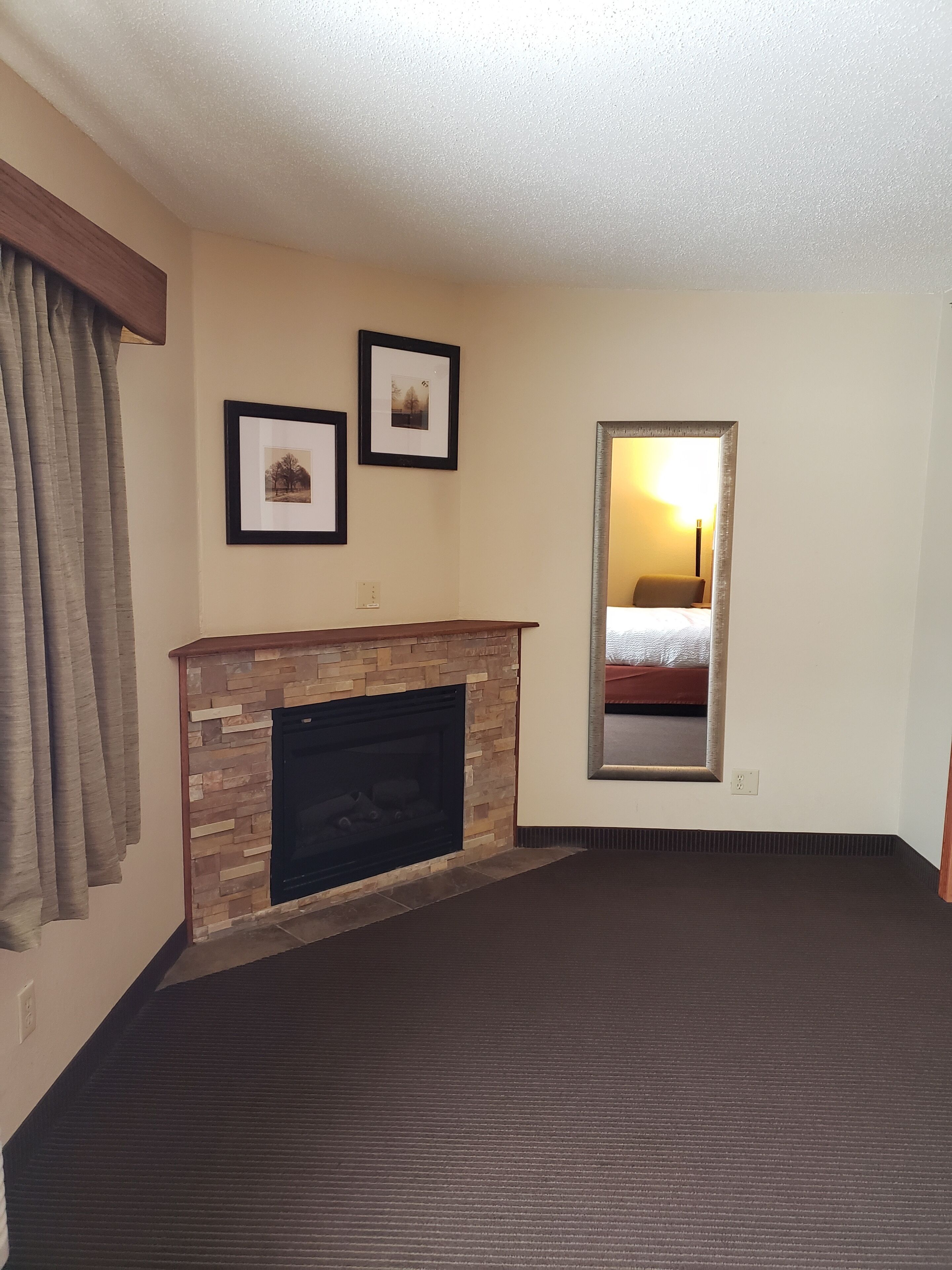 1 king bed, one bedroom, suite, non-smoking | desk, iron/ironing board, free cots/infant beds, free wifi