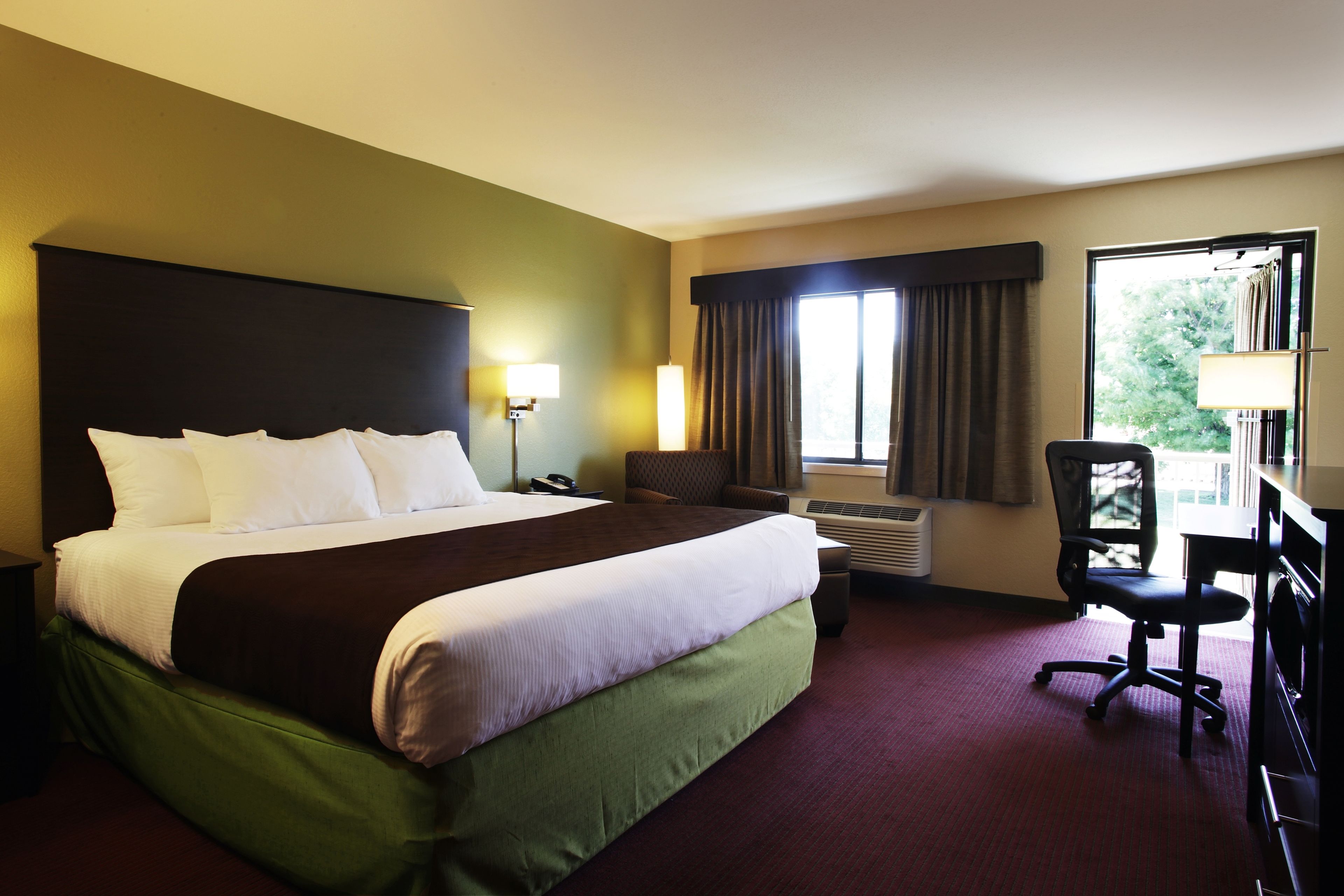 deluxe room, 1 king bed, non smoking (second floor) | premium bedding, desk, iron/ironing board, free cots/infant beds