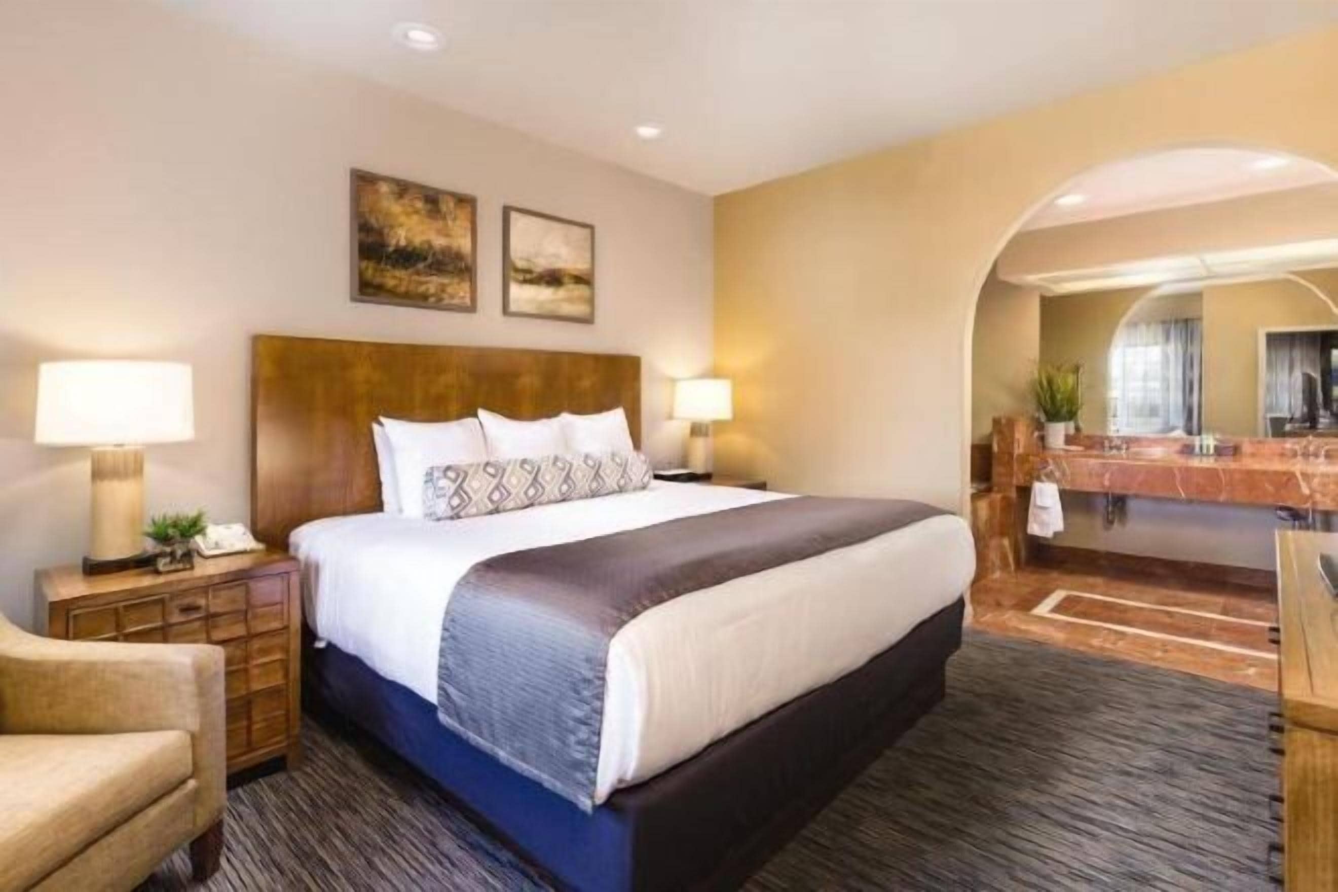 Hypo-allergenic bedding, pillow-top beds, in-room safe