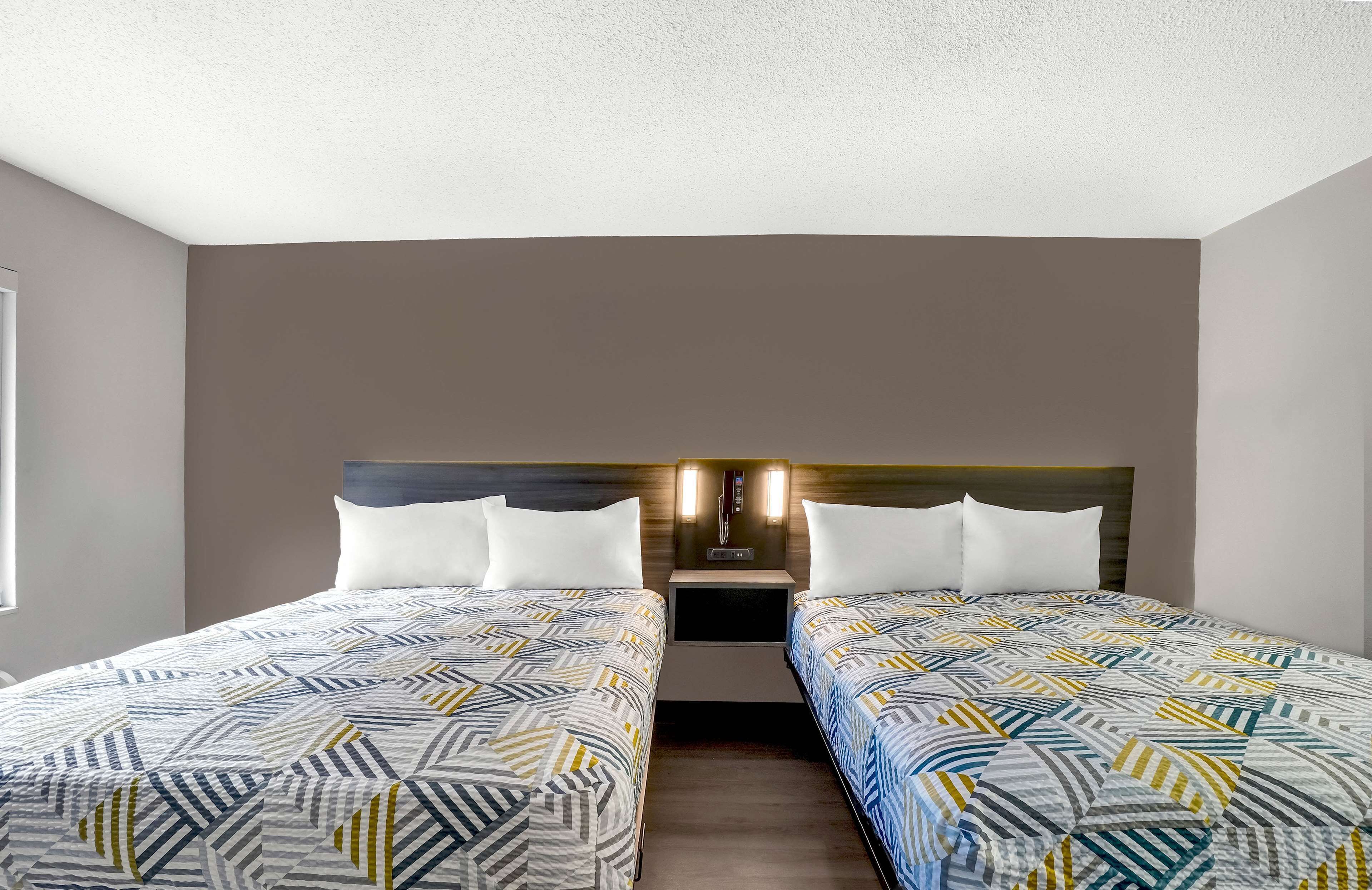 Desk, free WiFi, bed sheets, alarm clocks