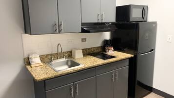 Fridge, microwave, stovetop, coffee/tea maker