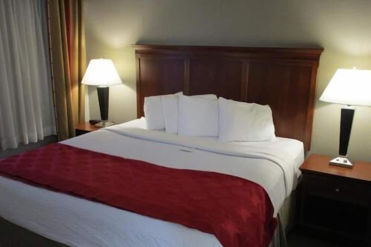 Desk, blackout curtains, iron/ironing board, rollaway beds