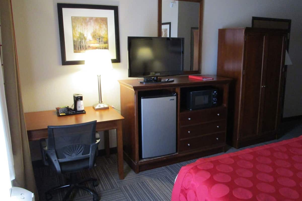 Desk, blackout curtains, iron/ironing board, rollaway beds