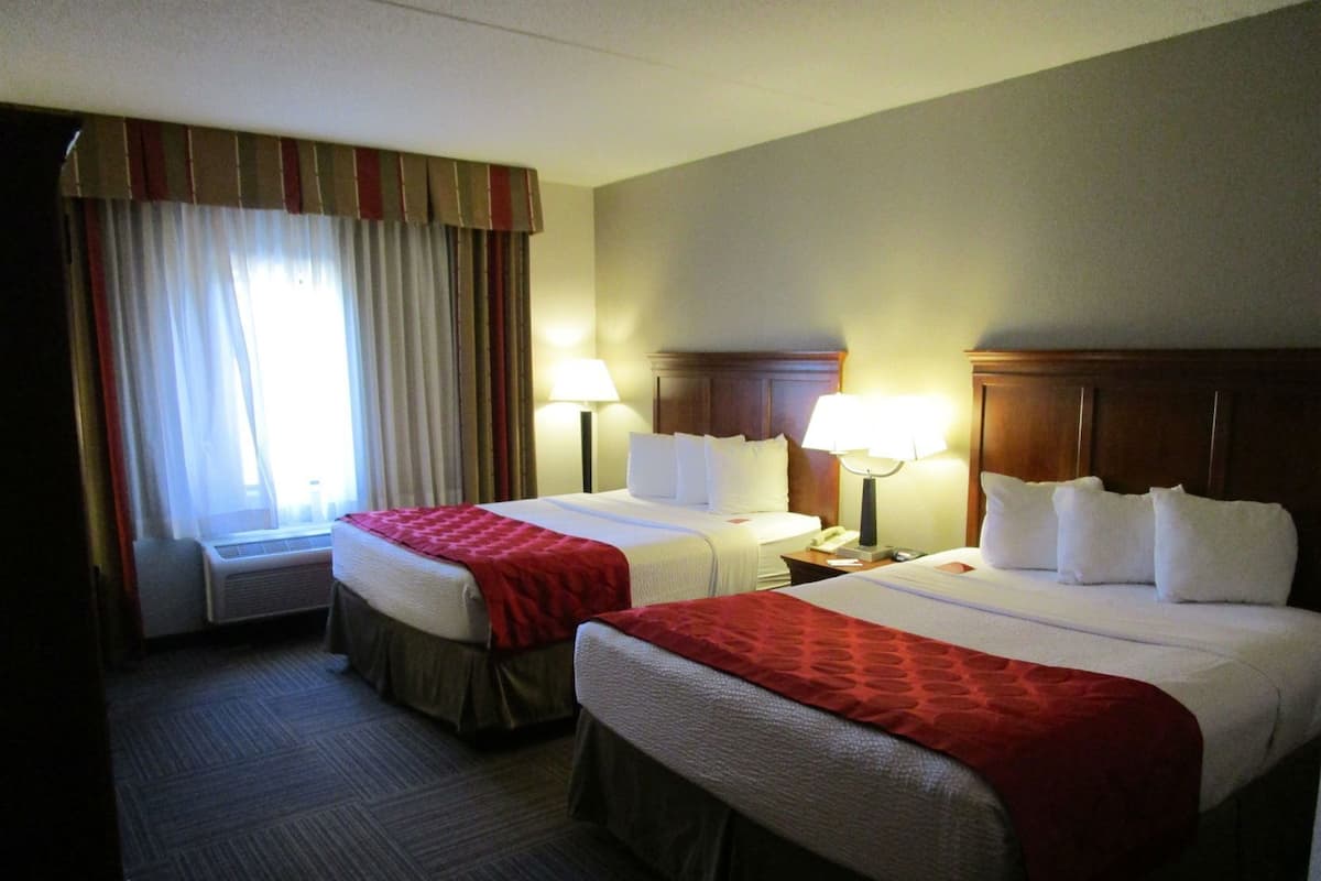 Desk, blackout curtains, iron/ironing board, rollaway beds