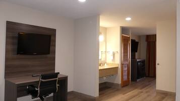 Suite, 1 King Bed, Non Smoking (One-Bedroom) | Living area | Flat-screen TV