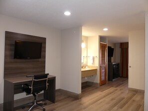 Suite, 1 King Bed, Non Smoking (One-Bedroom) | Living area | Flat-screen TV