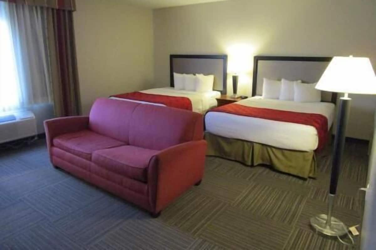 Desk, blackout curtains, iron/ironing board, rollaway beds