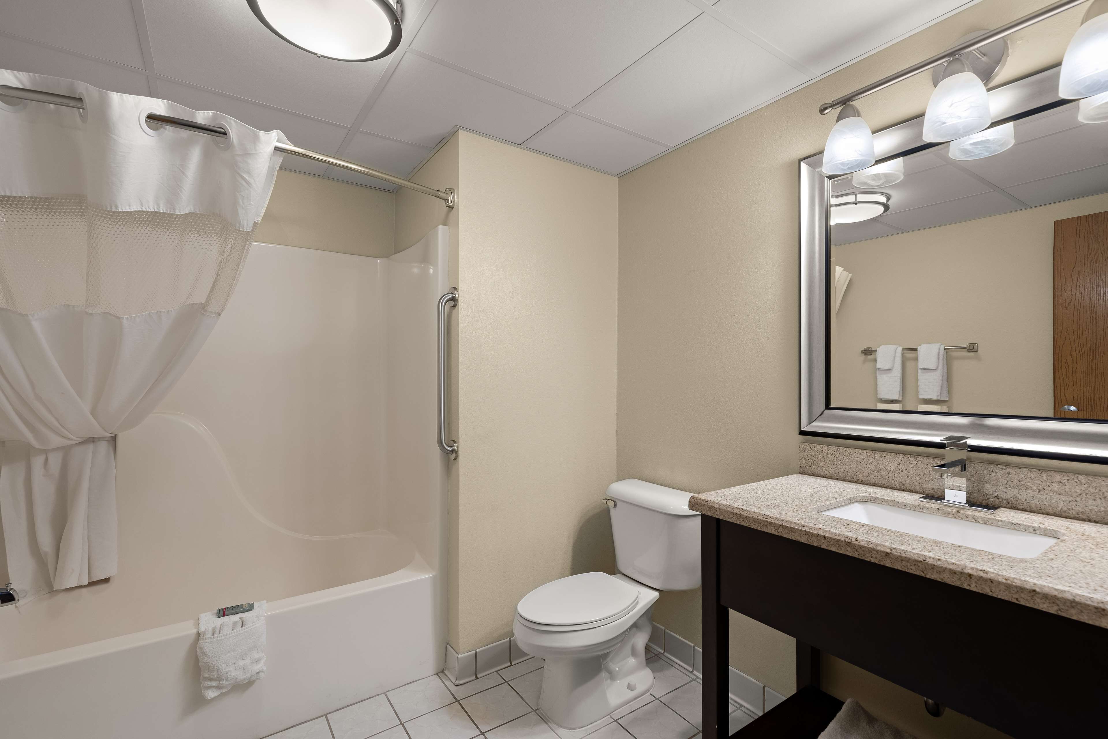 combined shower/bathtub, free toiletries, hair dryer, towels