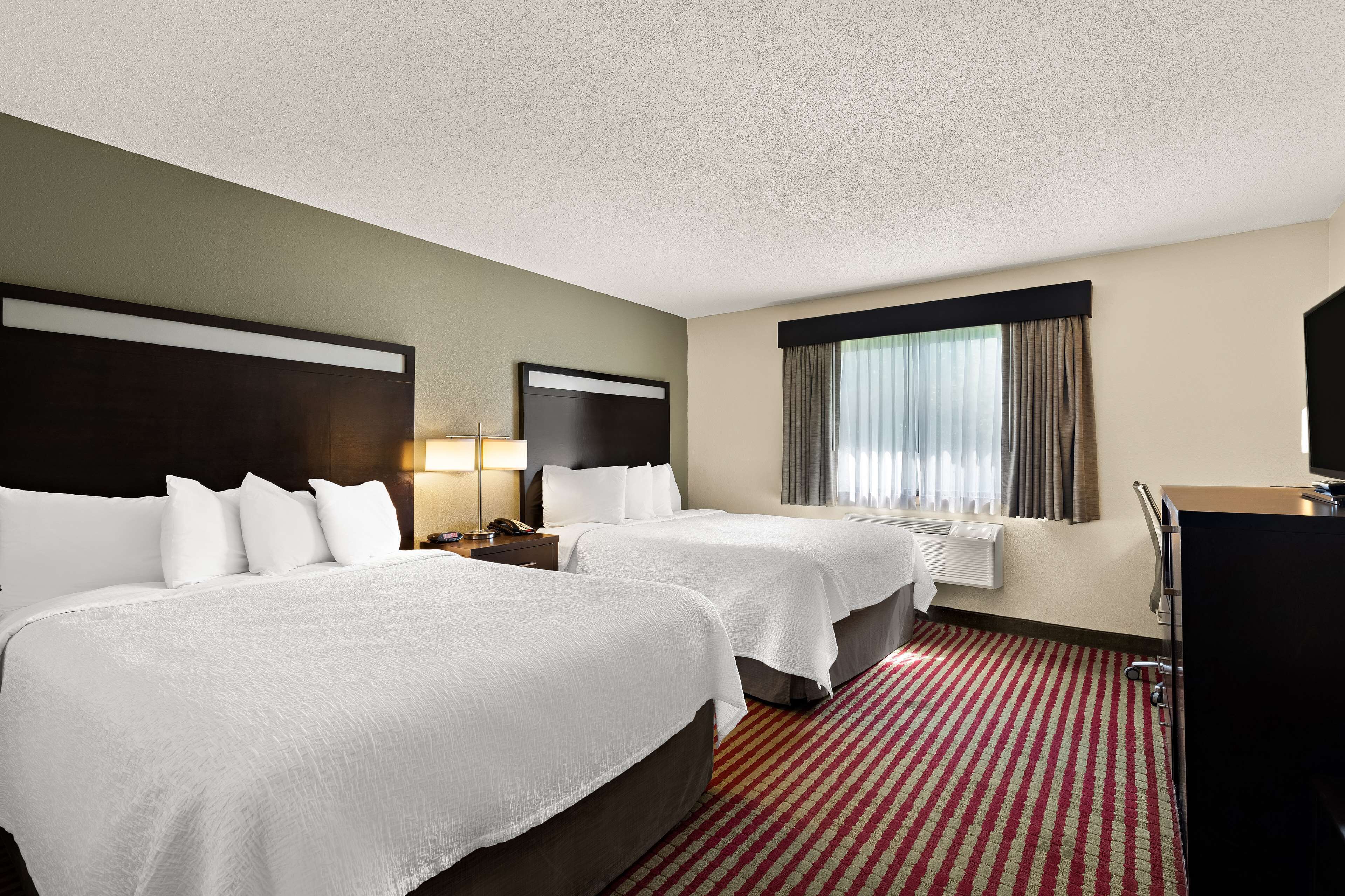 standard room, 2 queen beds, non smoking, refrigerator & microwave | desk, iron/ironing board, wifi, bed sheets