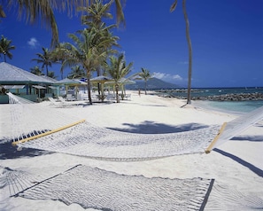 On the beach, sun loungers, beach umbrellas, beach towels
