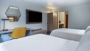 A hotel room with two beds, a desk with a chair, a TV, and a wardrobe. - Holiday Inn Express Portland SE- Clackamas Area by IHG (Gladstone)